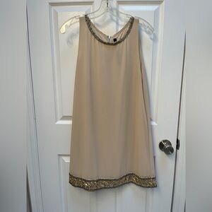 Renee C. Tan and Gold Mini Dress